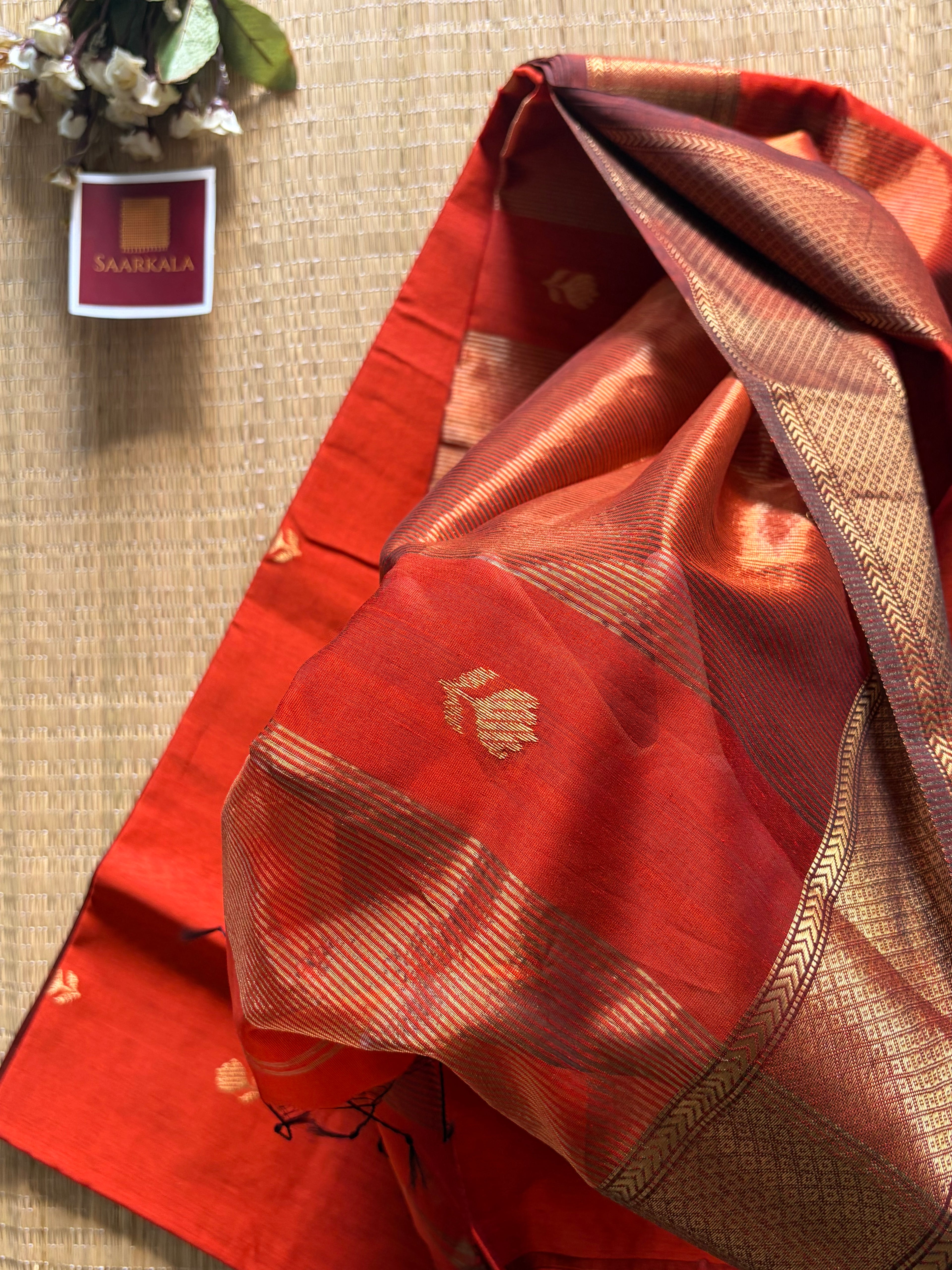 Rust Maheshwari silk and cotton Lotus Butta Saree