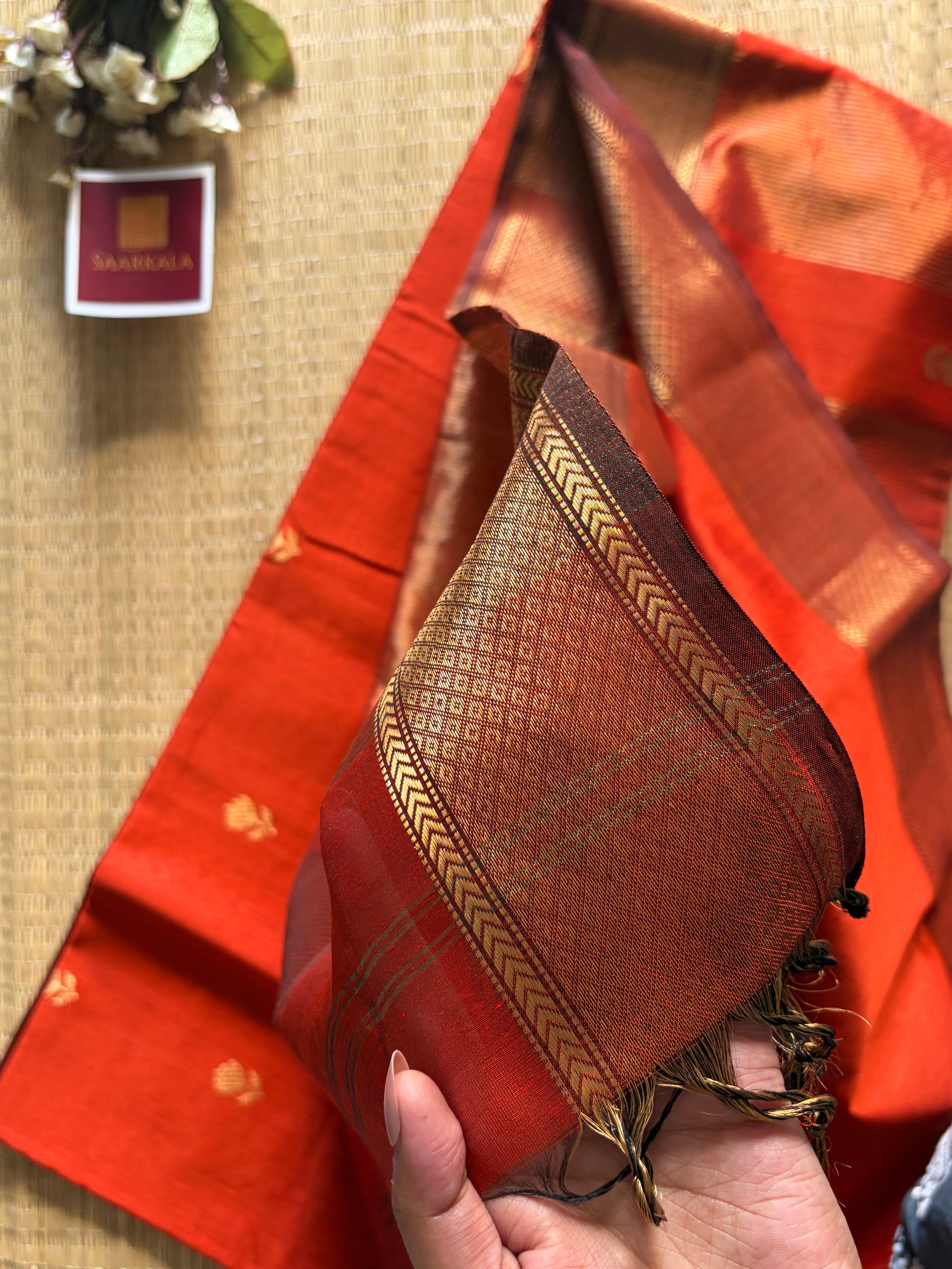 Rust Maheshwari silk and cotton Lotus Butta Saree
