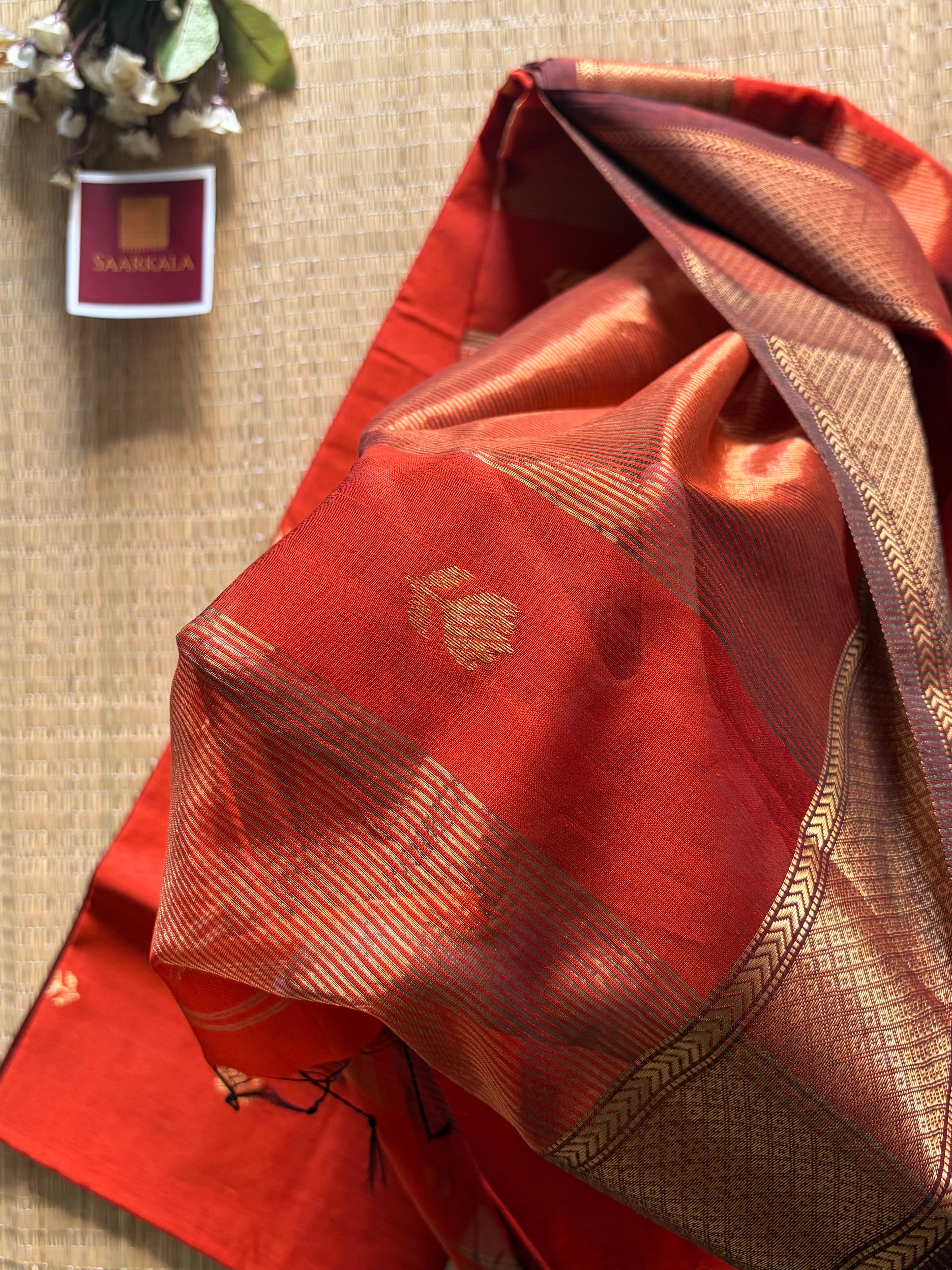 Rust Maheshwari silk and cotton Lotus Butta Saree